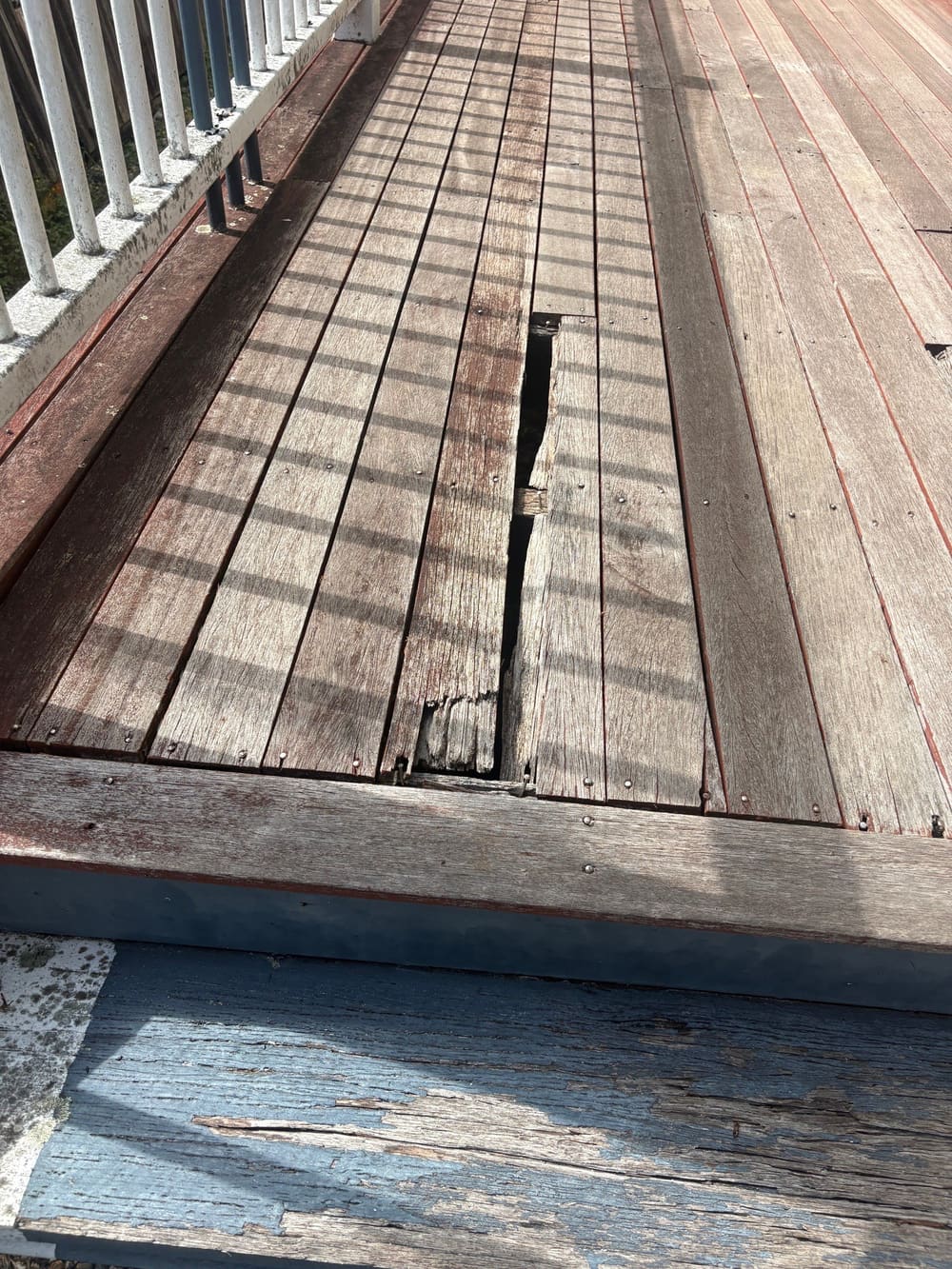 Deck damage/degraded, recorded during a pre-purchase inspection in Kedron