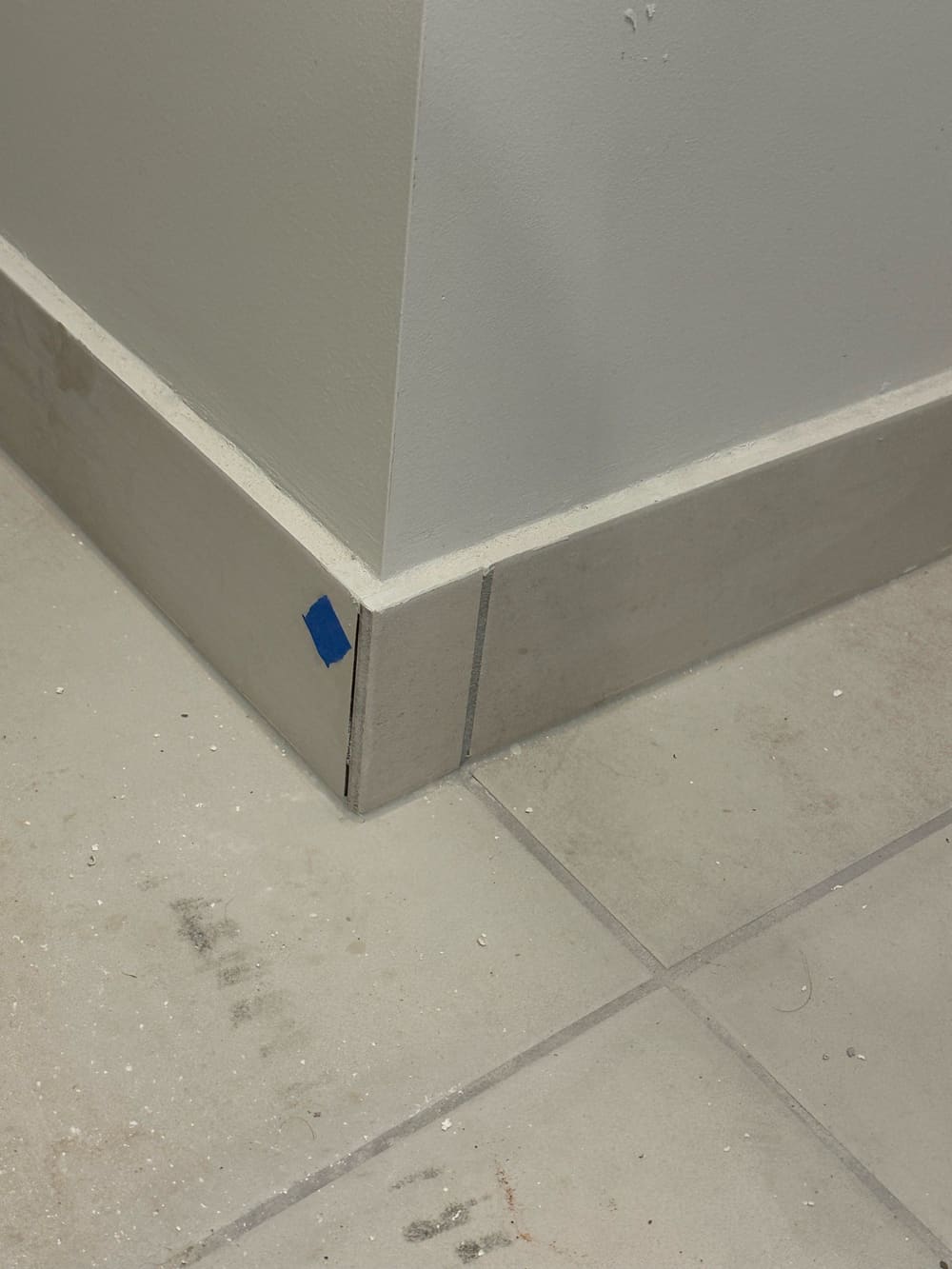 Grouting/joints defective, recorded during a handover inspection in Greenbank